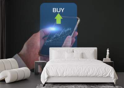 Stock market or forex trading graph and candlestick chart suitable for financial investment concept, businessman using smartphone and computer working with stock market data chart buy and sell Wall mural