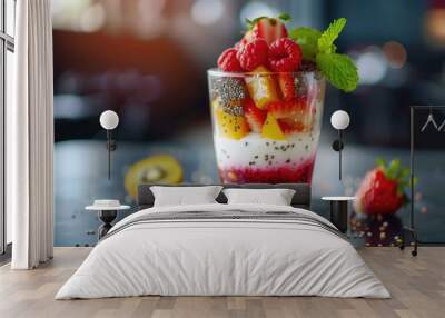 Healthy vegetarian fruit dessert with yogurt kiwi, strawberry, raspberry, orange, pineapple and chia seed pudding in a glass, summer detox superfoods, diet breakfast. Wall mural