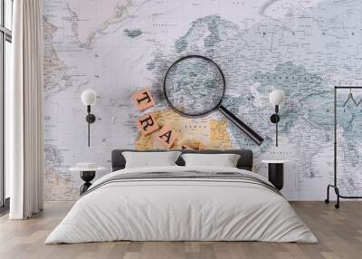 Conceptual background for travel with passport, magnifying glass, world map and money Wall mural