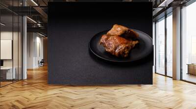 Delicious juicy chicken thighs baked on the grill with salt Wall mural