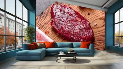 Fresh Raw Beef steak Mignon, with salt, peppercorns, thyme, tomatoes Wall mural