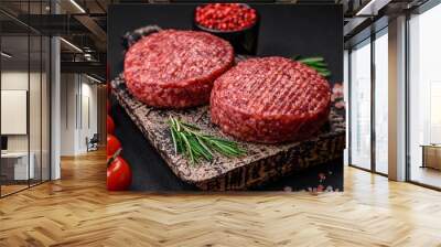 Fresh raw ground beef burger patty with salt and spices Wall mural