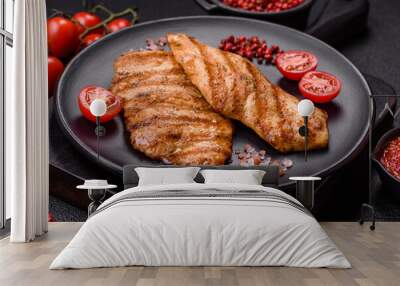 Juicy chicken fillet baked on the grill with salt, spices and herbs Wall mural