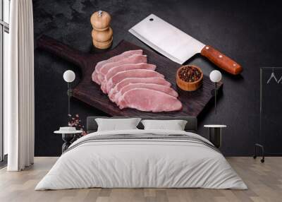 Raw fresh pork meat sliced on a wooden cutting board Wall mural