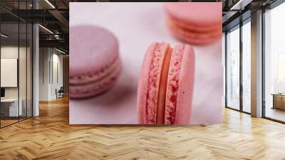 Wedding, St. Valentine's Day, birthday, preparation, holiday. Beautiful pink tasty macaroons on a concrete background Wall mural