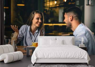 man and woman talking in cafeteria Wall mural