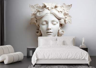Antique roman greek white marble gypsum bust of woman with grape leaves in hair on light background. Culture history concept Wall mural