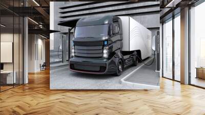 Hybrid electric truck being charging at charging station Wall mural