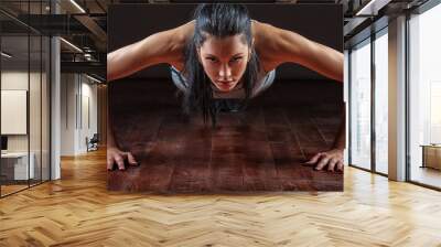 woman pushed from the floor Wall mural