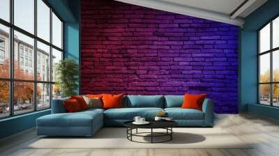 Neon light on brick walls that are not plastered background and texture. Lighting effect red and blue neon background of empty brick basement wall.Neon light on brick walls. Wall mural