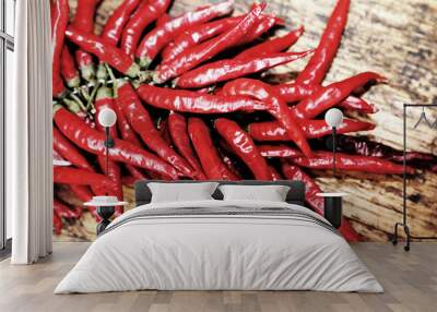 red hot peppers on wooden table at  market Wall mural