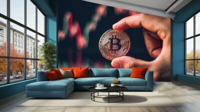 cryptocurrency golden bitcion. hand holding gold bitcoin - virtual graph for trading web  and international network payment. Wall mural