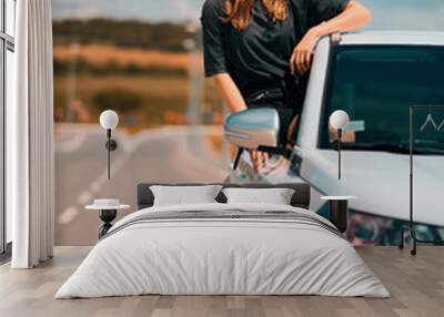 woman posing on car window Wall mural