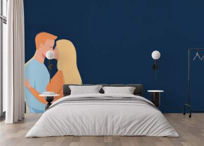 A charming blonde cartoon couple share a sweet moment, illuminated by a soft spotlight against a dark backdrop. Wall mural