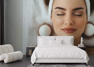 An elegant woman enjoys a skin rejuvenation treatment with RF lifting technology at a topnotch beauty salon. Wall mural