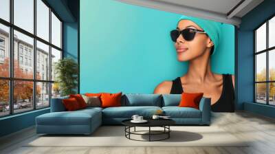 Vibrant and stylish portrait of a confident woman in sunglasses against a vivid background, showcasing bold beauty and flair. Wall mural