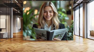 Portrait of business woman with smiley face reading a book in glasshouse cafeteria, Beautiful woman reading newspaper in the morning. Wall mural