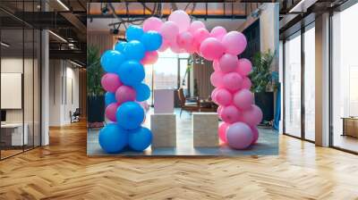 A festive photo zone with an arch of pink and blue balloons and decorative cubes for a gender reveal party.

 Wall mural