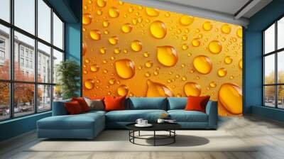 A vibrant and colorful close-up of water drops on an orange textured background, creating a lively and dynamic visual effect.

 Wall mural