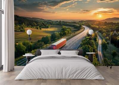 Two trucks overtake each other on a serene rural road under a stunning sunset sky Wall mural