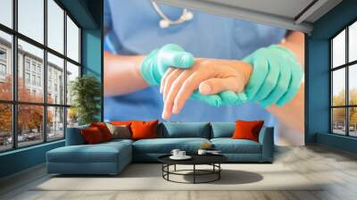 surgeon, surgical doctor, anesthetist or anesthesiologist holding patient's hand for health care tru Wall mural