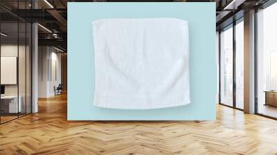 White cotton towel mock up template square size fabric wiper isolated on light pastel blue background with clipping path, flat lay top view for hand towel and face cloths mockup template Wall mural