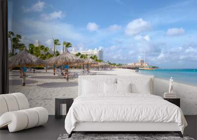 Palm Beach Aruba Caribbean, white long sandy beach with palm trees at Aruba Antilles. Wall mural