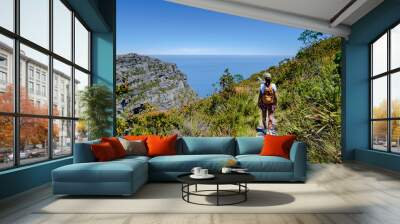 view from the Table Mountain in Cape Town South Africa, view over the ocean, and Lion's Head from Table Mountain Cape Town, Asian women hiking in the mountains of Cape Town South Africa Wall mural