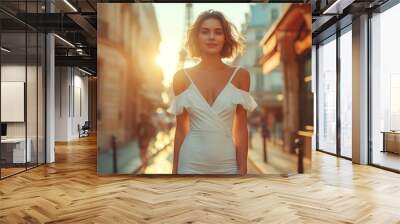 woman walking in the city of Paris,European woman model short hair and smiling face wearing a fitted casual white color short slip dress with on the background the Eifel tower of Paris Wall mural