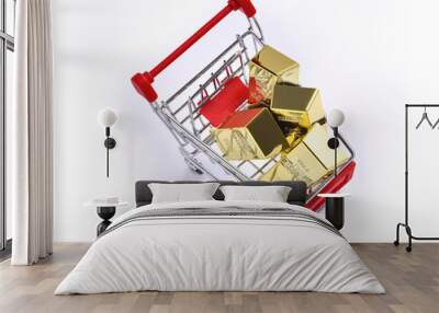 Gold bars in red shopping cart. Wall mural