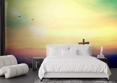 Ascension day concept: Silhouette cross on meadow autumn sunrise background Wall mural