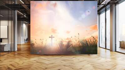 Ascension day concept: The cross on meadow autumn sunrise background Wall mural