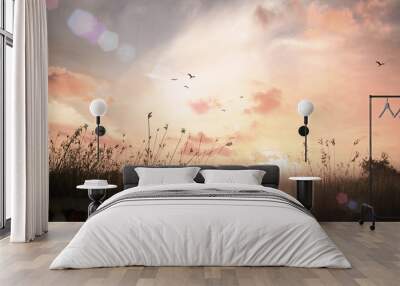 World environment day concept: Beautiful meadow and sky autumn sunrise background Wall mural