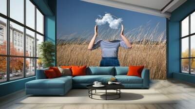 surrealism with a woman holding a mirror and covering her face in the field with a transparent backg Wall mural