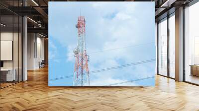 Mobile phone communication tower transmission blue sky background Wall mural