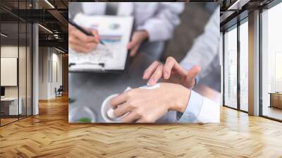 Beauty eco cosmetic research and development concept, Scientist or Pharmacist applying moisturizer lotion on her hand for efficacy testing of natural organic skincare products in laboratory Wall mural