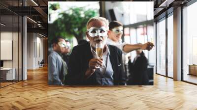 business team party, businessman and businesswomen waering fancy mask on the party, cheerful teamwork, happy fun time work concept, celebration on sucess. Wall mural