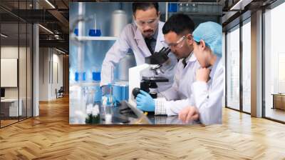 Health care researchers working in life science laboratory Wall mural