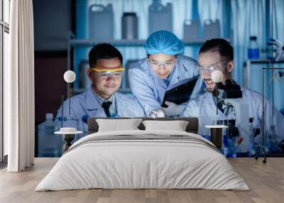 Health care researchers working in medicals science technology research in laboratory Wall mural