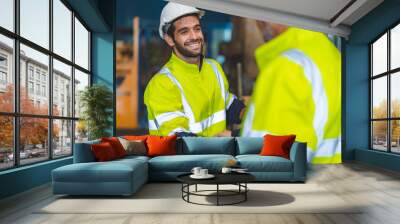 industrial factory with men at work concept, professional engineer foreman inspector talking in business occupation job teamwork with team, construction manager working in manufacturing technology job Wall mural