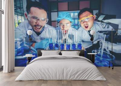 medical science technology research in chemical laboratory, professional scientist working for experiment test in healthcare medicine work with glassware equipment and blue liquid Wall mural