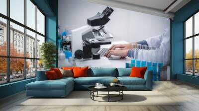 Medical scientists are analyzing data in the laboratory. Wall mural