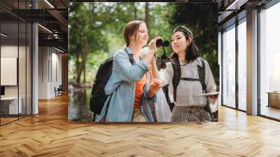 woman family or friends group trekking travel in adventure lifestyle, nature mountain hiking in vacation holiday with journey of holiday maker in happy leisure together in summer of backpacker trip Wall mural