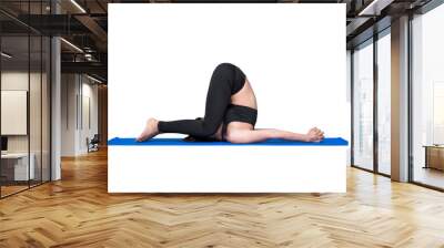 Asian woman practice yoga pose exercise at the yoga sport gym isolated on white background Wall mural