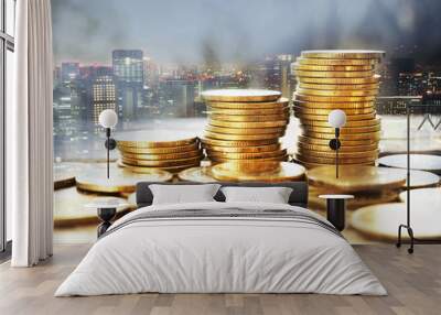 Double exposure of city and stack of coins for finance and banking concept Wall mural