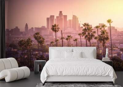 Beautiful sunset of Los Angeles downtown skyline and palm trees in foreground Wall mural