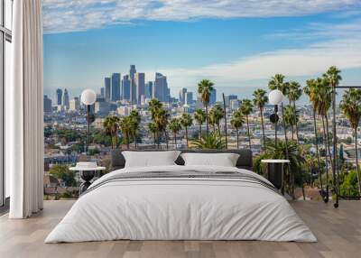 Cloudy day of Los Angeles downtown skyline and palm trees in foreground Wall mural