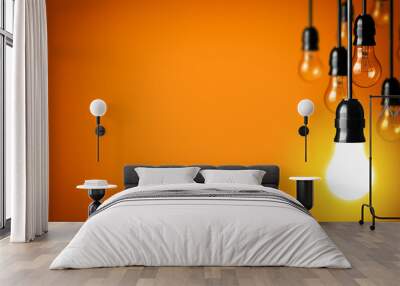 Idea concept on orange background. Wall mural