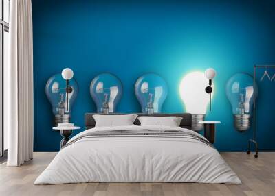 Idea concept with row of light bulbs and glowing bulb Wall mural