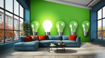 Idea concept with row of light bulbs and glowing bulb Wall mural